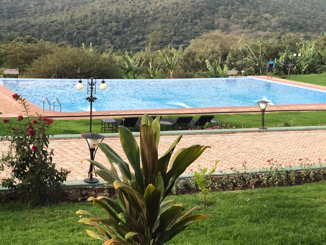 Swimming pool with mountain backdrop